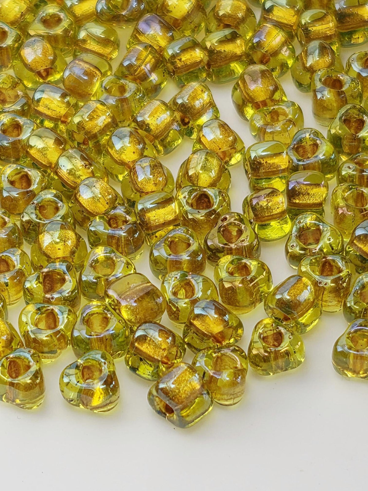 Miyuki Triangle Beads, Peridot Amber Inside Color Lined | Sparkle | Size 5/0