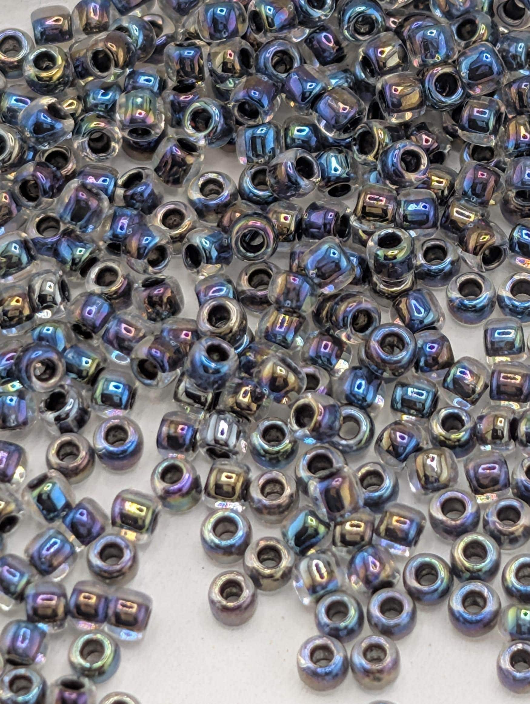 Bronze-Lined Black Diamond Toho Round Beads, Rainbow Finish | Size 11/0