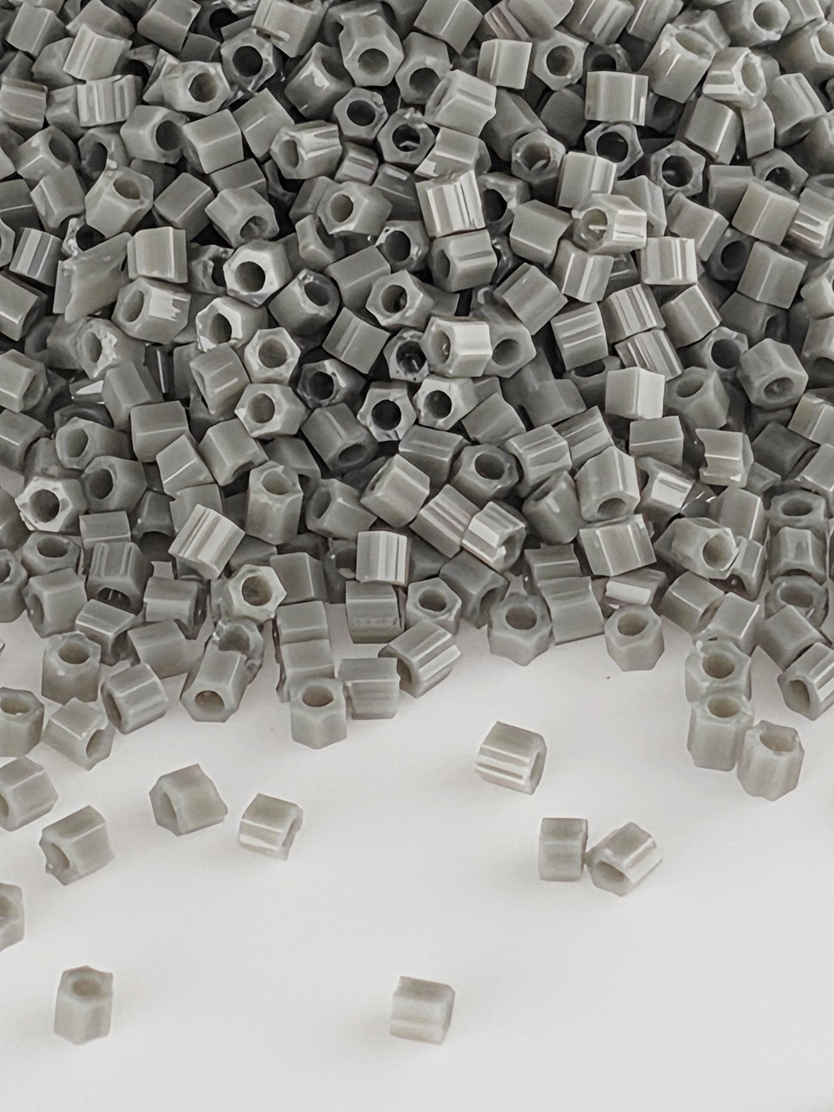 Toho Hexagon Seed Beads 15/0, Opaque Dark Gray | Japanese Glass | 2.5" Tube