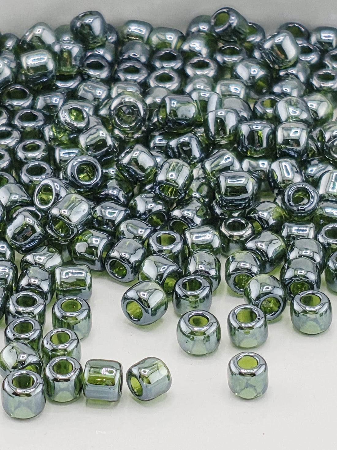 Toho Round Beads, Transparent-Lustered Olivine | 8/0 | 8g Pack
