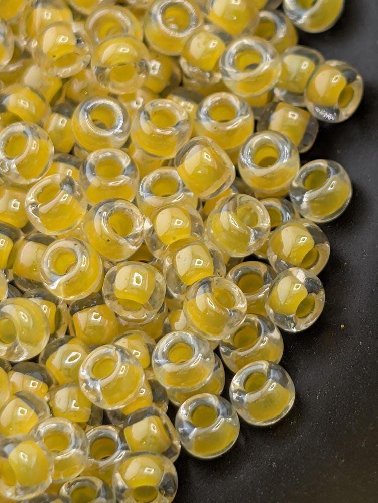 Crystal/Canary Yellow Inside Color Lined Rocaille | 8/0 | Miyuki - 15g pkg