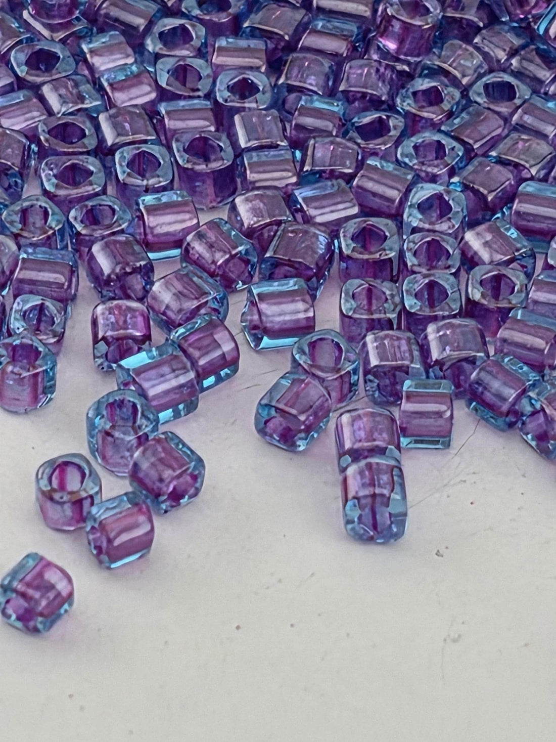 Toho Cube Beads, Aqua/Purple-Lined | 2mm | 2.5in tube (~8g) Pack