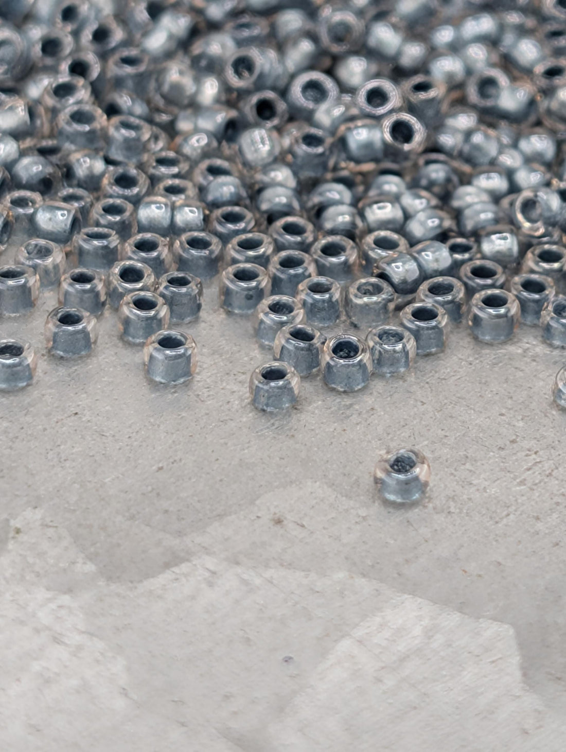 Toho Round Beads, Crystal/Metallic Blue | 15/0 | 8g Pack