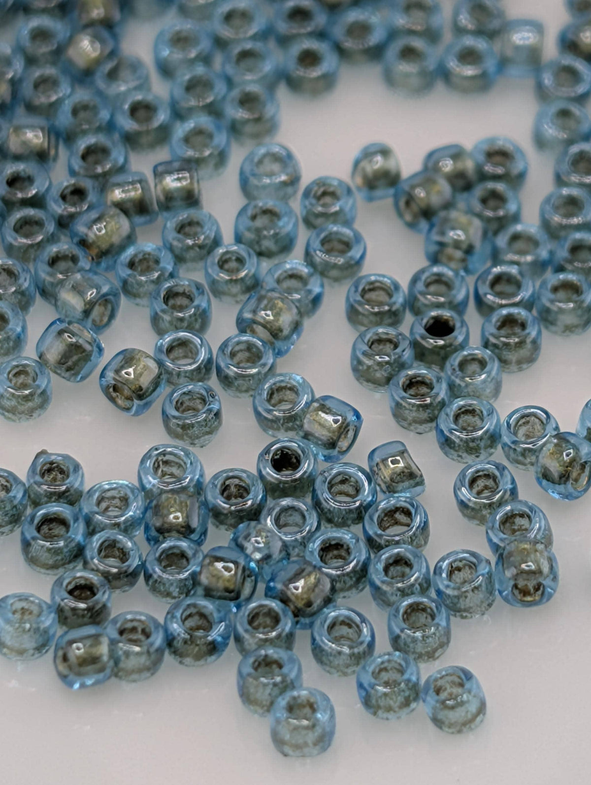 15/0 Toho Round, Inside-Color Aqua | Gold-Lined | Bead Weaving Supply