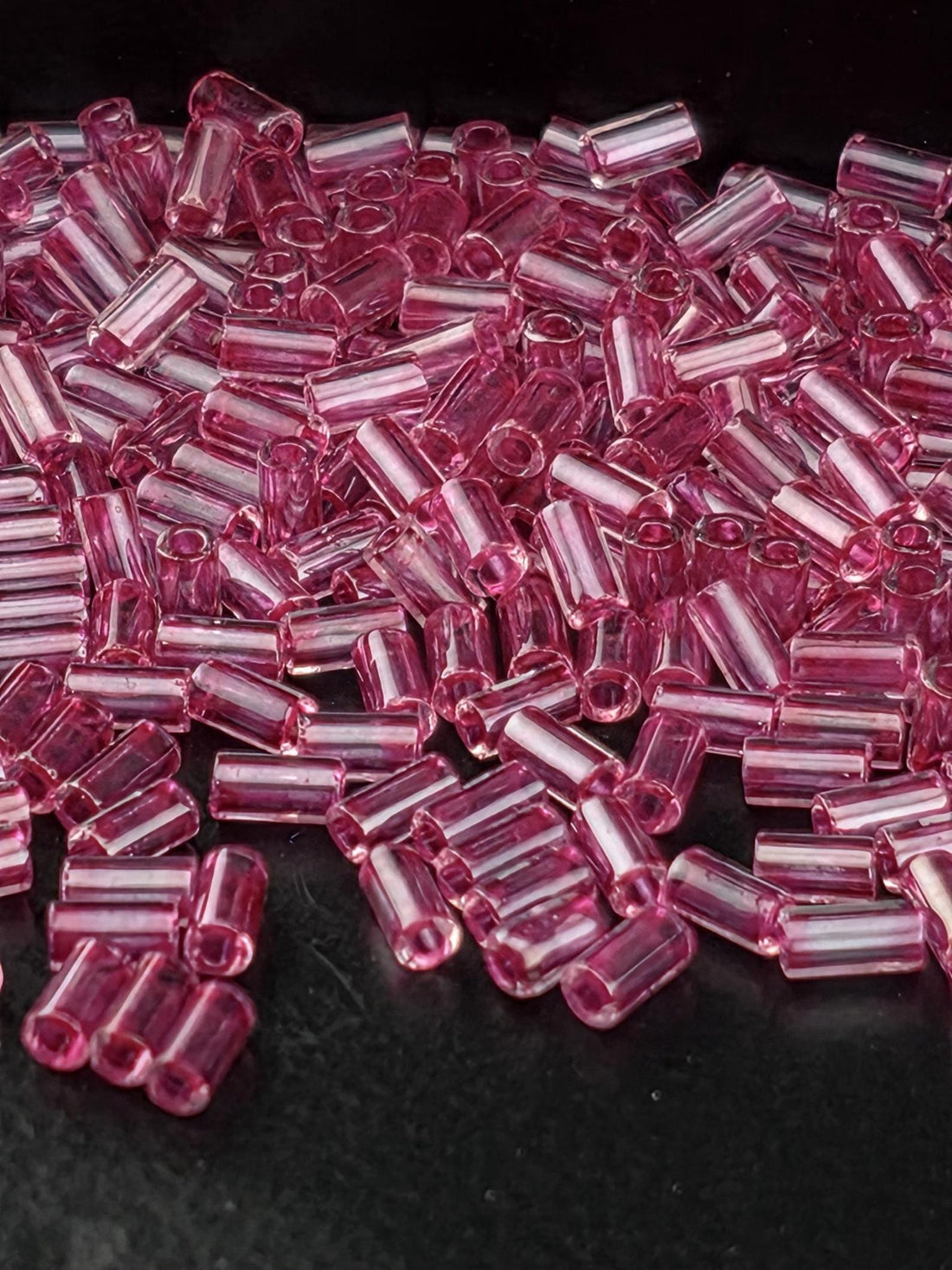 Toho Bugle Beads, Crystal/Fuchsia-Lined | #1 (3mm) | 2.5in tube (~7g) Pack