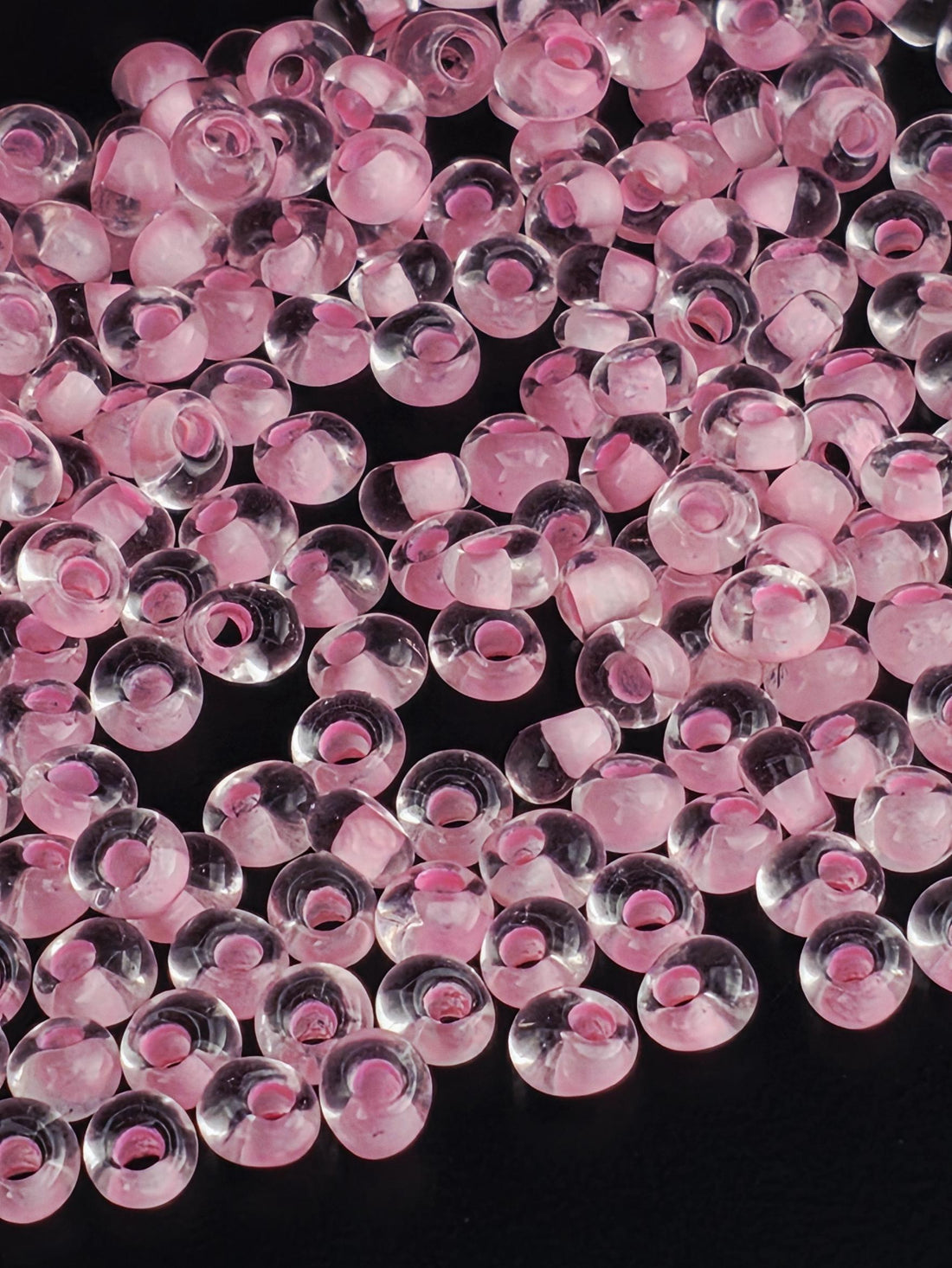 Toho Magatama Beads, Inside-Color Crystal/Neon Carnation-Lined | 3mm | 7-8g (14g packs) Pack
