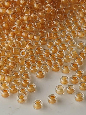 Crystal/Soft Orange Inside Color Lined | Miyuki Rocaille | 11/0 | 15g pkg