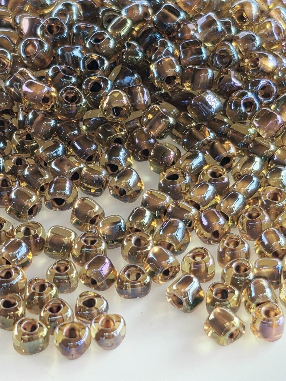 Miyuki Triangle Beads, Amber Brown Inside Color Lined | 8/0 Size | 15g Pack