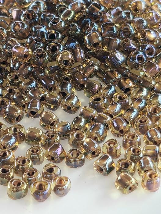 Miyuki Triangle Beads, Amber Brown Inside Color Lined | 8/0 Size | 15g Pack