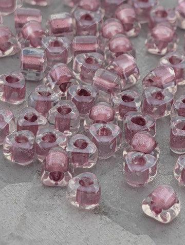 Miyuki Triangle Beads, Crystal/Mauve Inside Color Lined Sparkle | 5/0 | 15g Pack