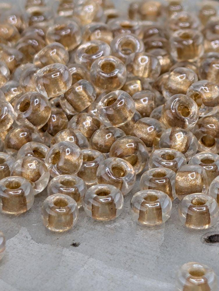 Crystal/Gold Inside Color Lined Sparkle Rocaille | 6/0 | Miyuki - 15g pkg