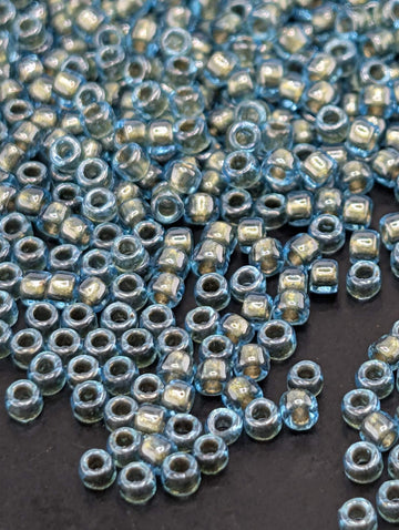 15/0 Toho Round, Inside-Color Aqua | Gold-Lined | Bead Weaving Supply