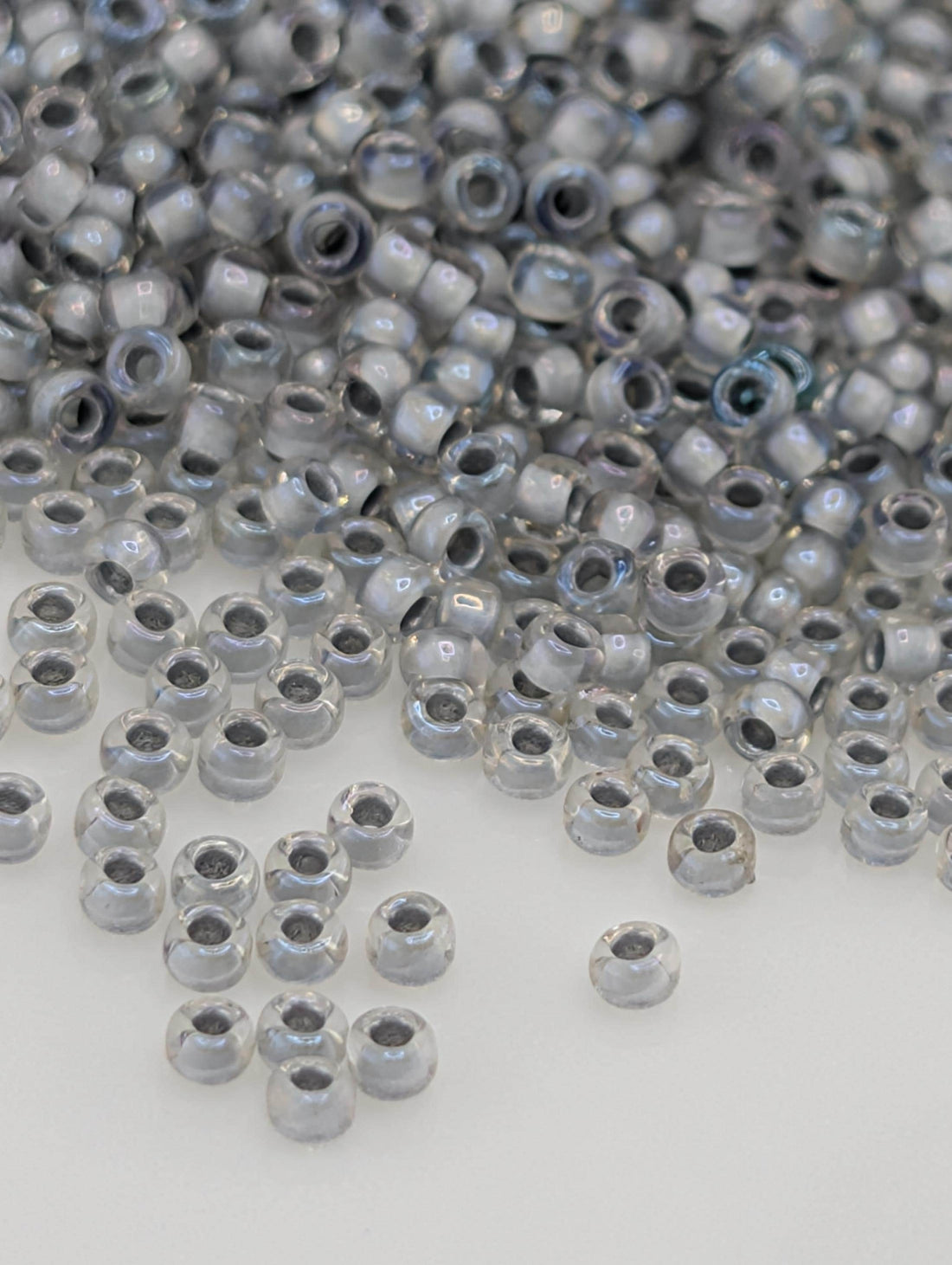 Toho Round Beads, Rainbow Crystal/Gray-L | 15/0 | 8g Pack
