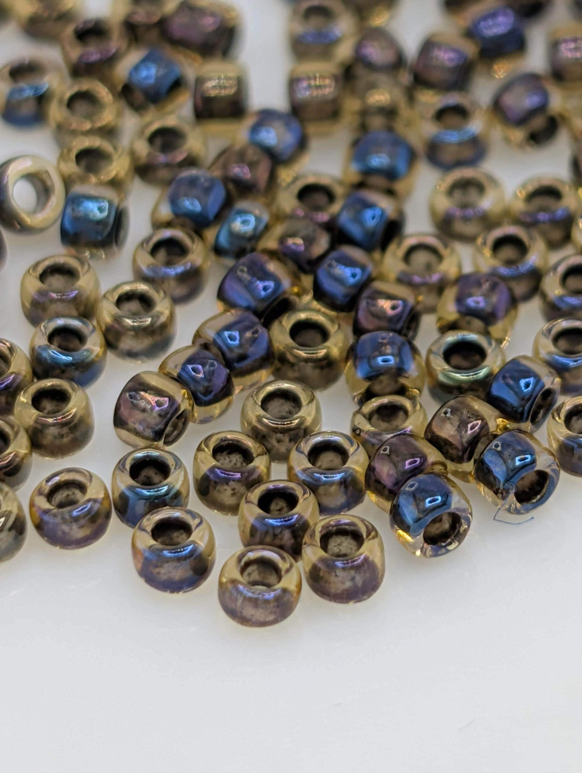 Toho Round Size 15/0 Glass Seed Beads, Inside-Color Rainbow Jonquil | Jet-Lined Finish | 2.5" Tube