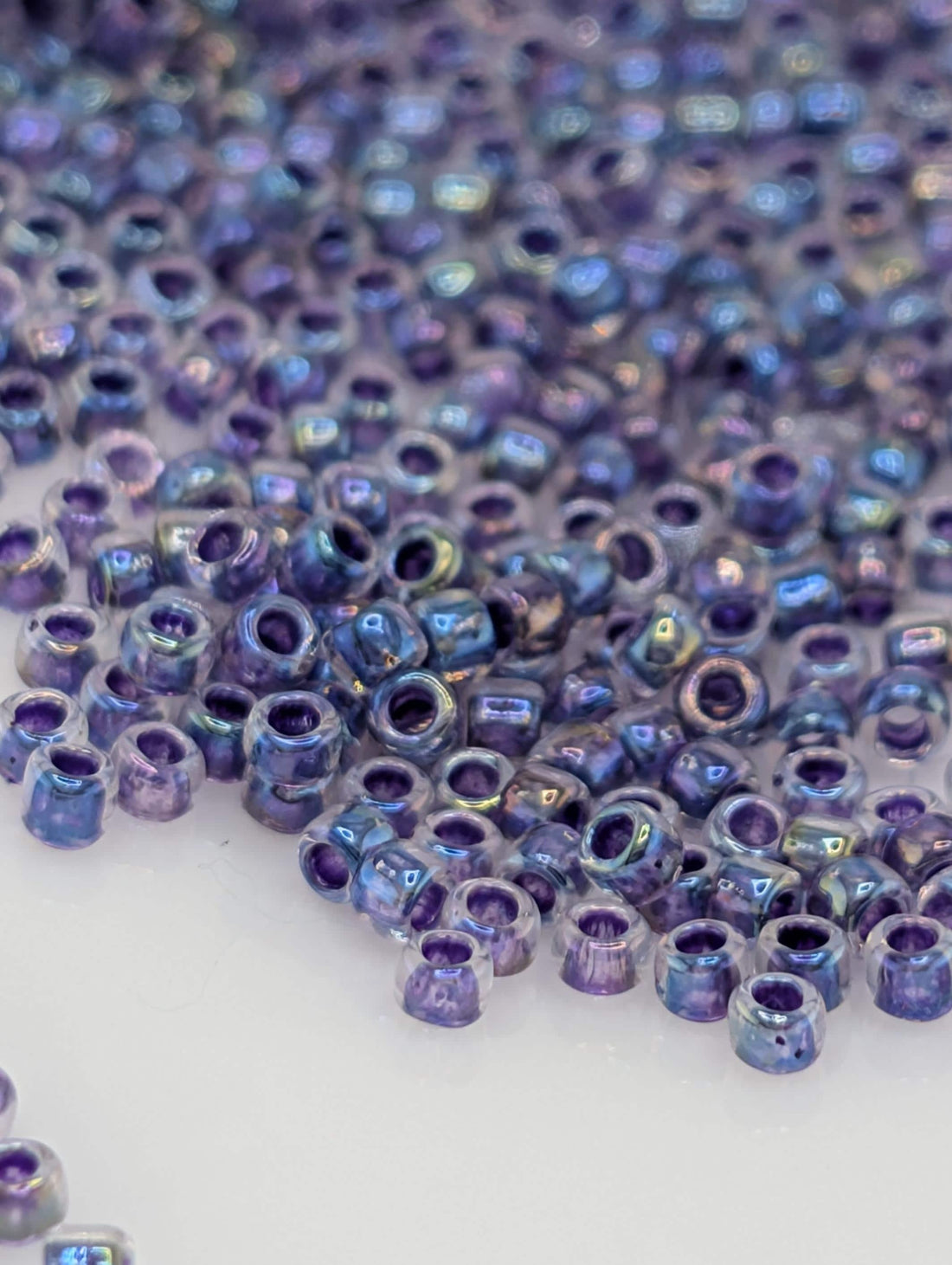 Toho Round Beads, Rainbow Crystal/Grape | 15/0 | 8g Pack