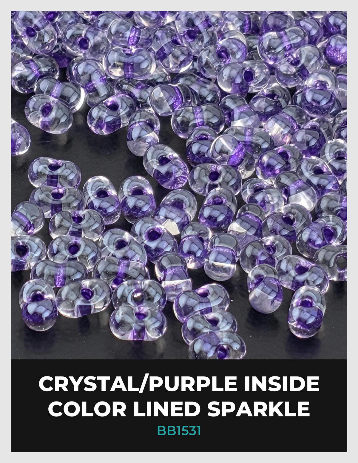 a collection of clear glass beads with purple and white stripes, scattered on a dark background.