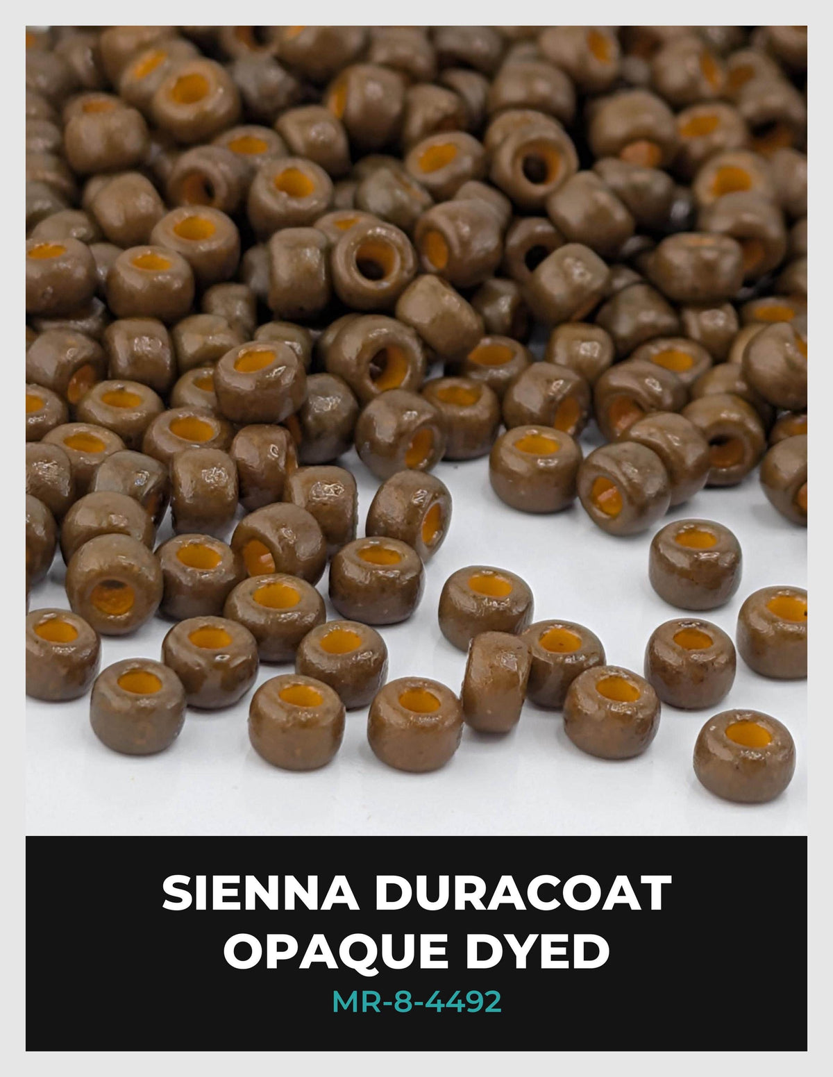 a large pile of brown, round beads on a white background.
