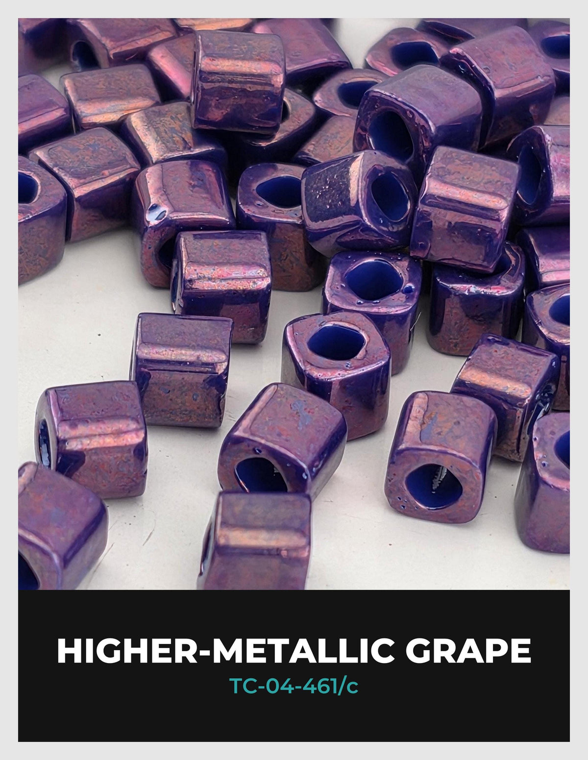 a collection of purple-colored metal beads or nuts, with a focus on their metallic properties and the word "HIGHER-METALLIC GRAPE" prominently displayed.