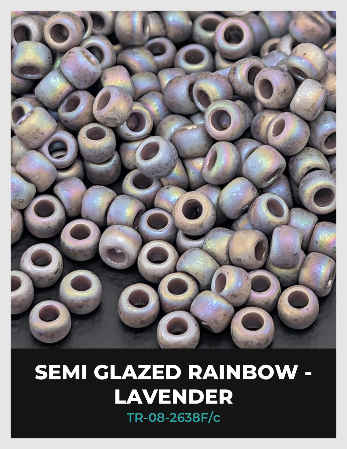 a collection of small, round beads in various colors, including shades of purple and blue, arranged in a visually appealing manner.