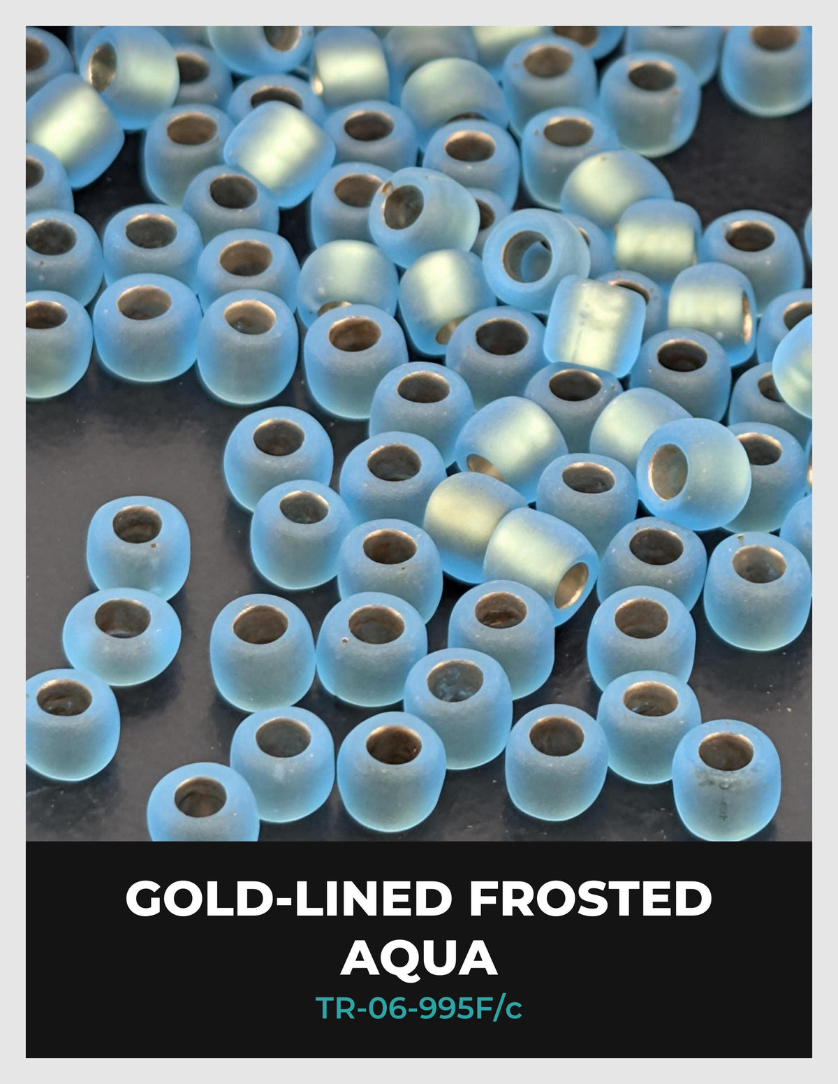 a collection of small, round, blue-colored beads or stones, with some of them appearing to be frosted or glazed. The text in the image indicates that these are "Gold-lined Frosted Aqua" beads, with a specific mention of "TR-06-995F/c".