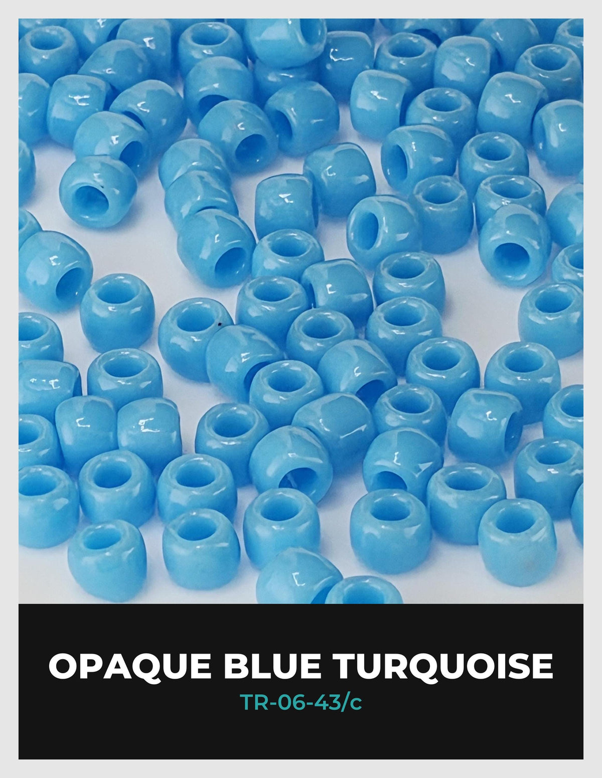 a collection of small, round, blue beads or beads arranged in a pattern.