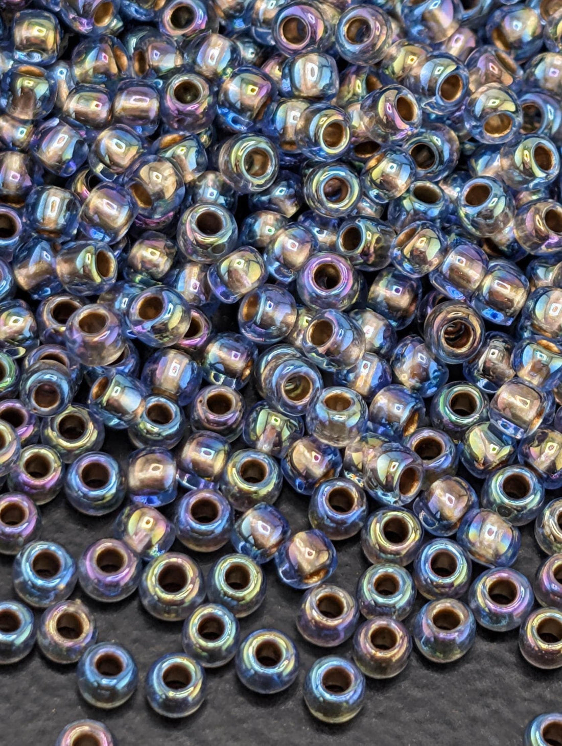 Toho Seed Beads, Gold Lined Rainbow Lt Sapphire | 11/0 Round | 8g Pack