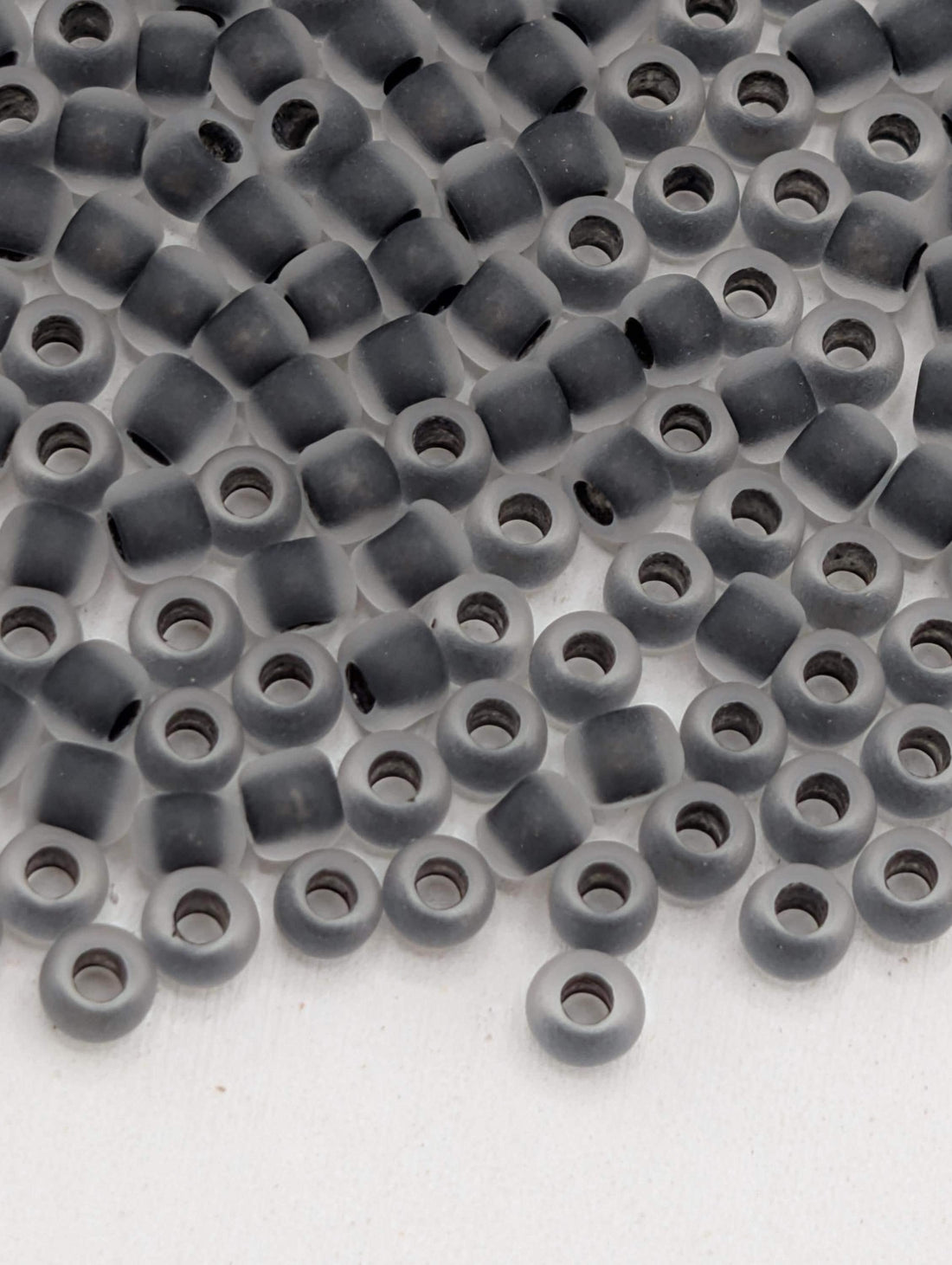 Toho Round Beads, Frosted Crystal/Dk Opaque Purple-Lined | 11/0 | 8g Pack