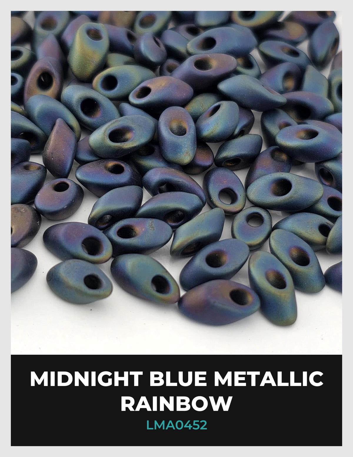 a close-up view of numerous metallic beads in various shades of blue, arranged in a visually appealing manner.