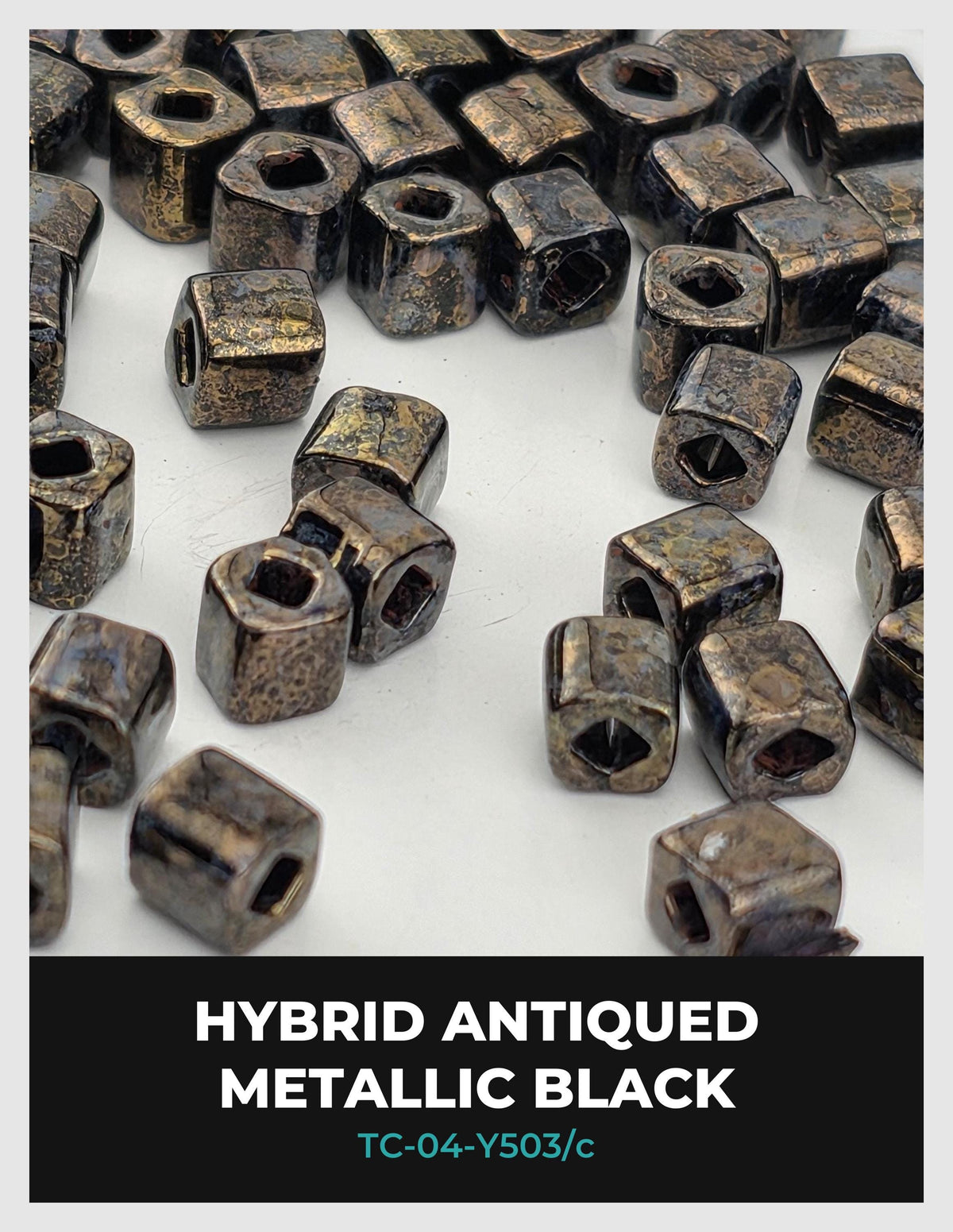 a collection of metallic black beads or nuts, with a focus on their unique, antique-looking appearance.