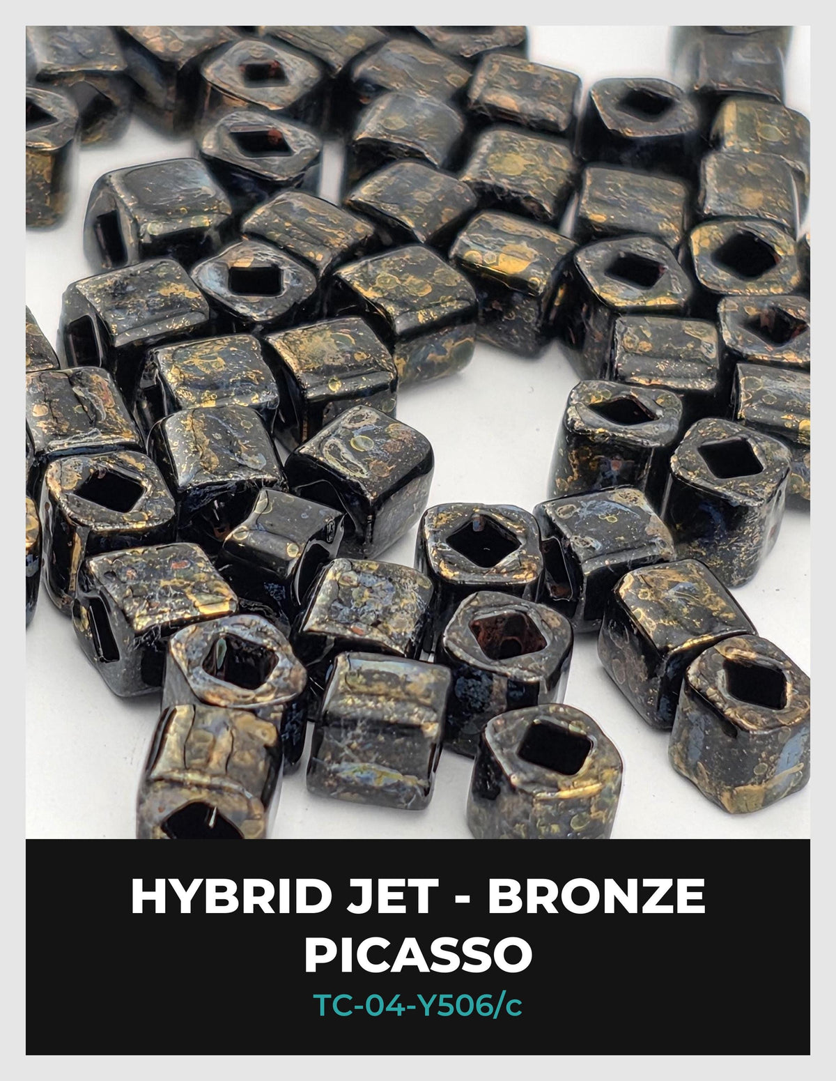 a collection of black and gold metallic beads, likely used for jewelry or other decorative purposes.