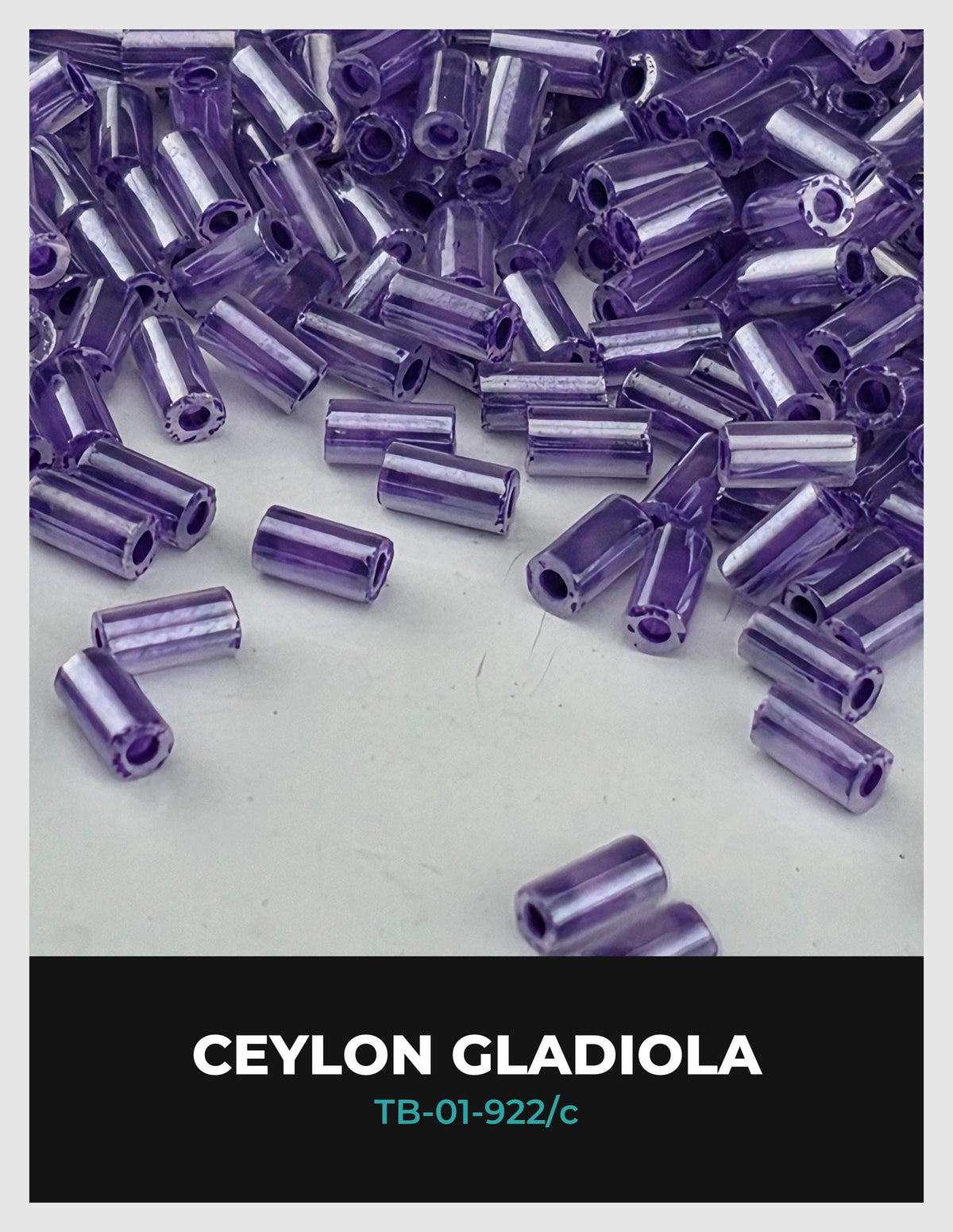 a collection of purple beads or beads in shades of purple, scattered across a white background.