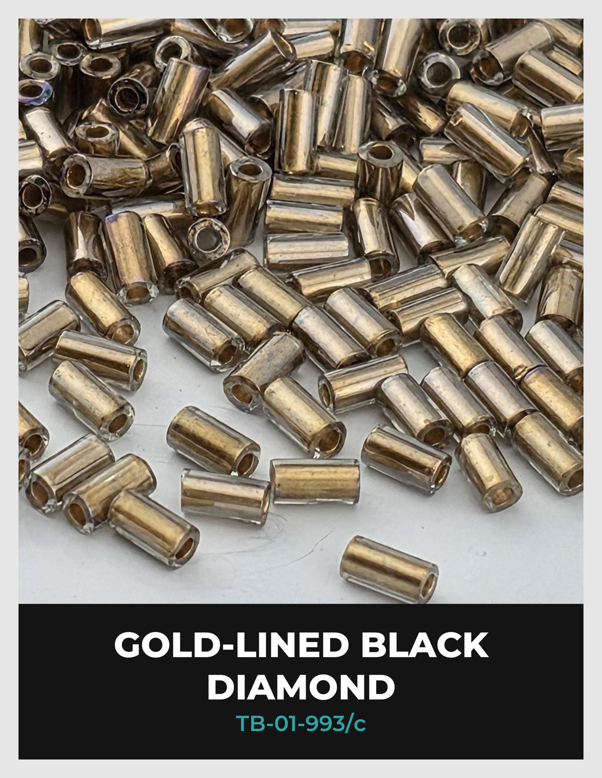 a collection of gold-colored, black diamond-shaped beads scattered on a white background.