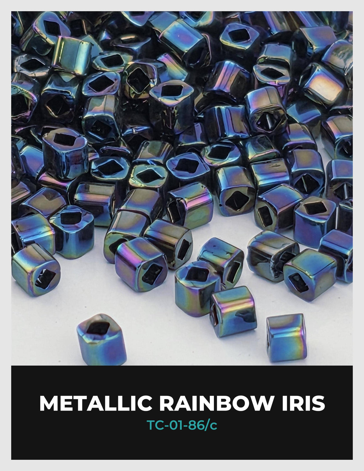 The image is a close-up of numerous metallic rainbow iris beads, with their iridescent colors and shapes creating a visually striking and vibrant display.