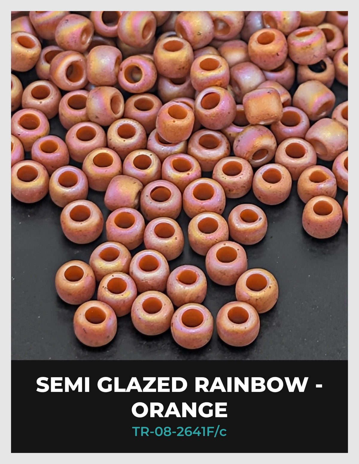 a collection of small, round beads in various shades of orange, arranged in a visually appealing manner.