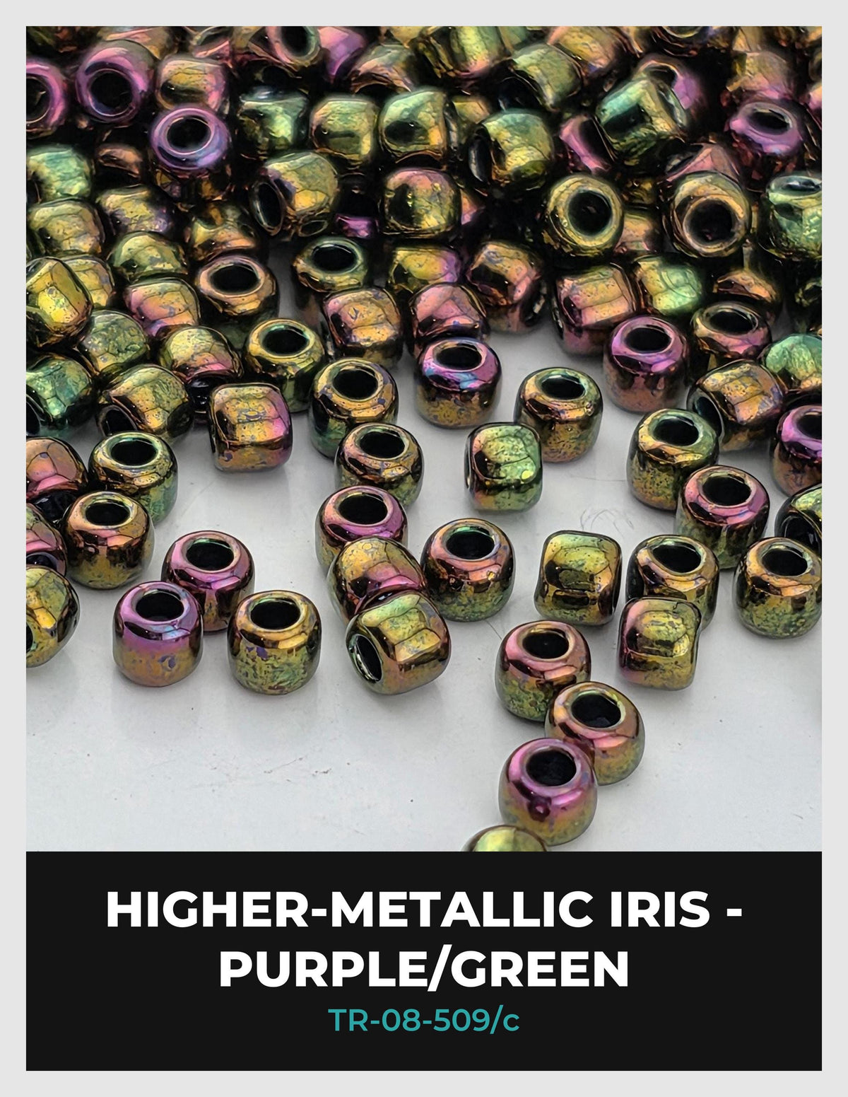 a collection of colorful beads, including metallic iridescent beads in shades of purple, green, and yellow.