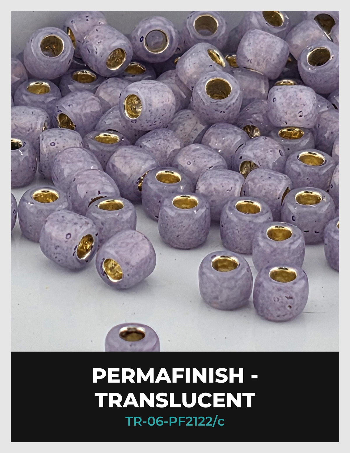 a collection of purple beads with gold-colored holes, arranged in a visually appealing manner.
