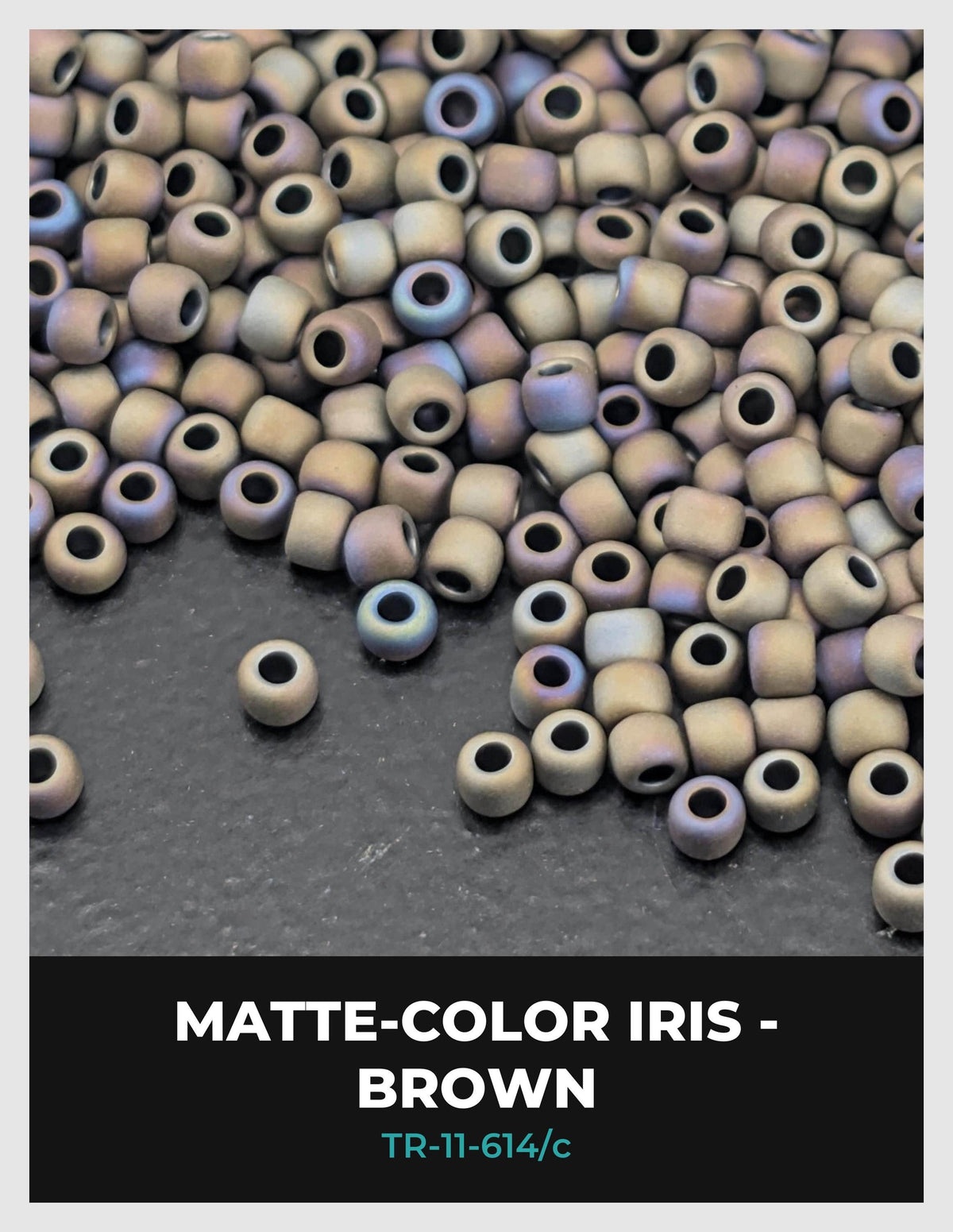 a collection of small, round beads in various shades of brown, scattered on a dark surface.