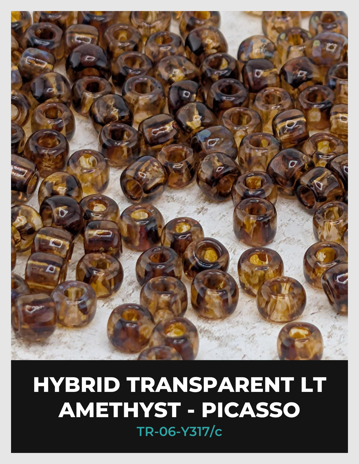 a collection of brown and clear beads, likely transparent glass beads, arranged in a visually appealing manner.