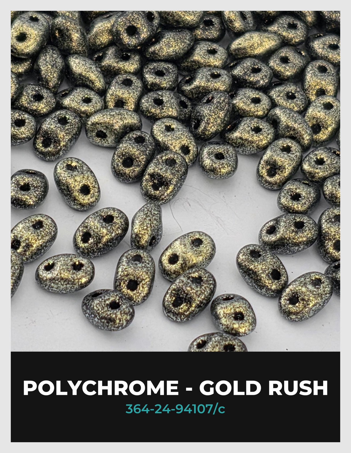 a collection of small, shiny, and metallic beads in various colors, including gold and black, scattered across a surface.